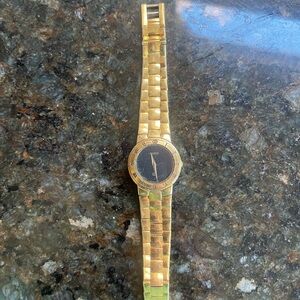 Gucci Gold and Black Round Dial Bracelet Watch